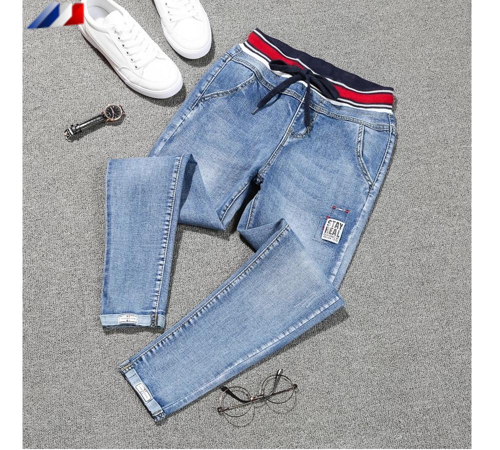 Jeans con cintura a rayas para mujer